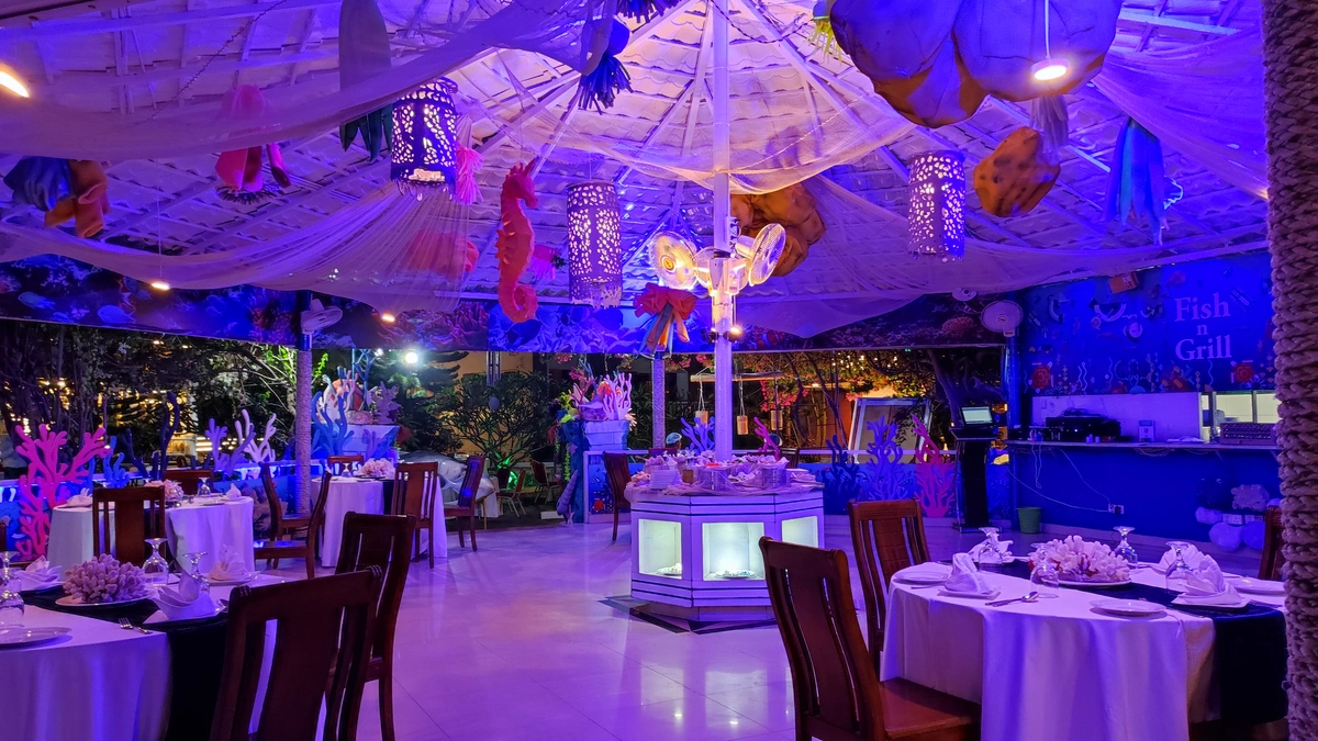Fish n' Grill seafood restaurant with coral-inspired interiors